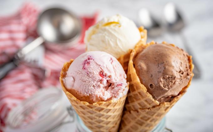 strawberry, vanilla, chocolate ice cream with waffle cone on marble stone backgrounds