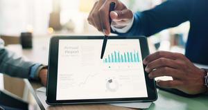 Business,Person,,Hands,And,Tablet,Screen,With,Statistics,For,Company